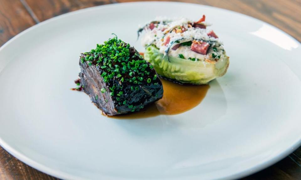 Braised ox with a ‘hefty canoe of powerfully dressed cos lettuce’.