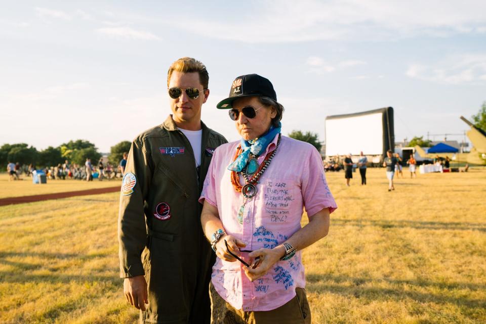 Val Kilmer, right, stood next to an Ice Man look-a-like at a special Rolling Roadshow screening of the original "Top Gun" in Austin, Texas on August 31.