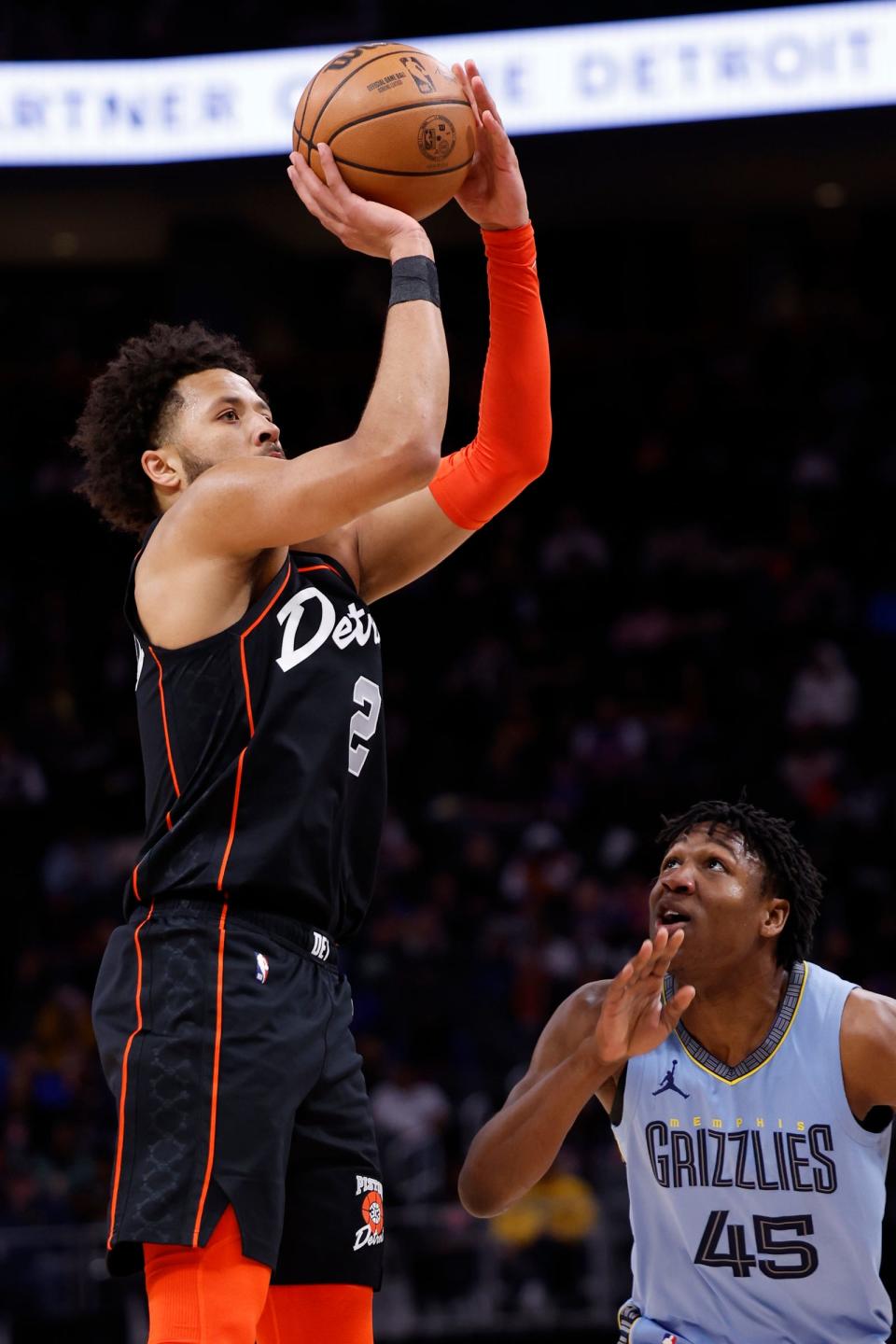 Detroit Pistons guard Cade Cunningham shoots over Memphis Grizzlies forward GG Jackson in the first half at Little Caesars Arena in Detroit, April 1, 2024.