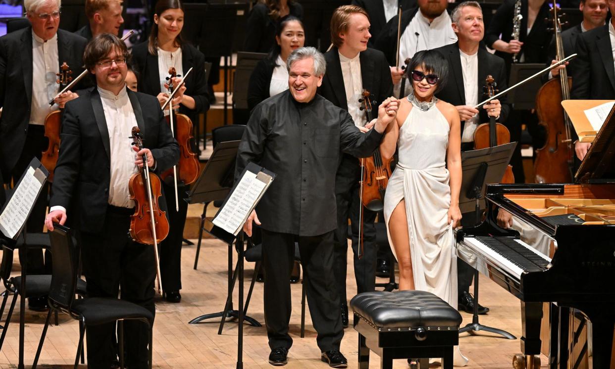 <span>Teeming with drama… Yuja Wang in dark glasses with Antonio Pappano and the London Symphony Orchestra.</span><span>Photograph: Mark Allan</span>