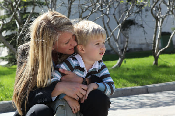 NASA astronaut Karen Nyberg shares a quiet moment with her 3-year-old son Jack during a tour of the Kremlin and Red Square in Moscow, Russia, on May 8. Nyberg and two crewmates will launch on a six-month mission to the International Space Stati