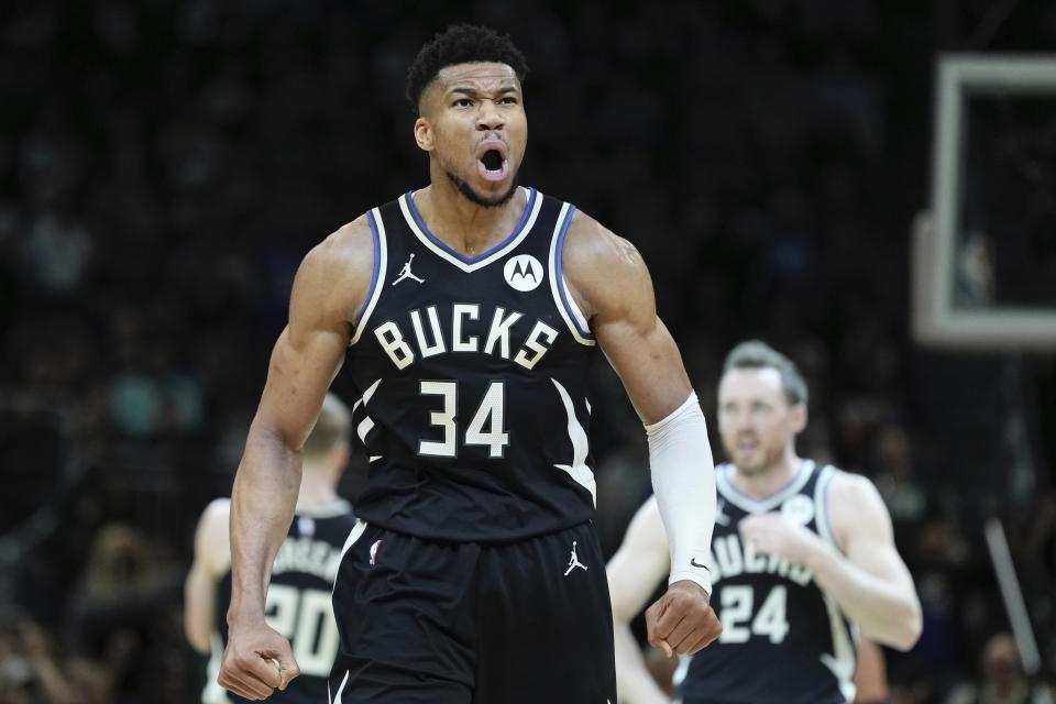 Milwaukee Bucks' Giannis Antetokounmpo reacts during the first half of an NBA basketball game Tuesday, April 9, 2024, in Milwaukee. (AP Photo/Morry Gash)