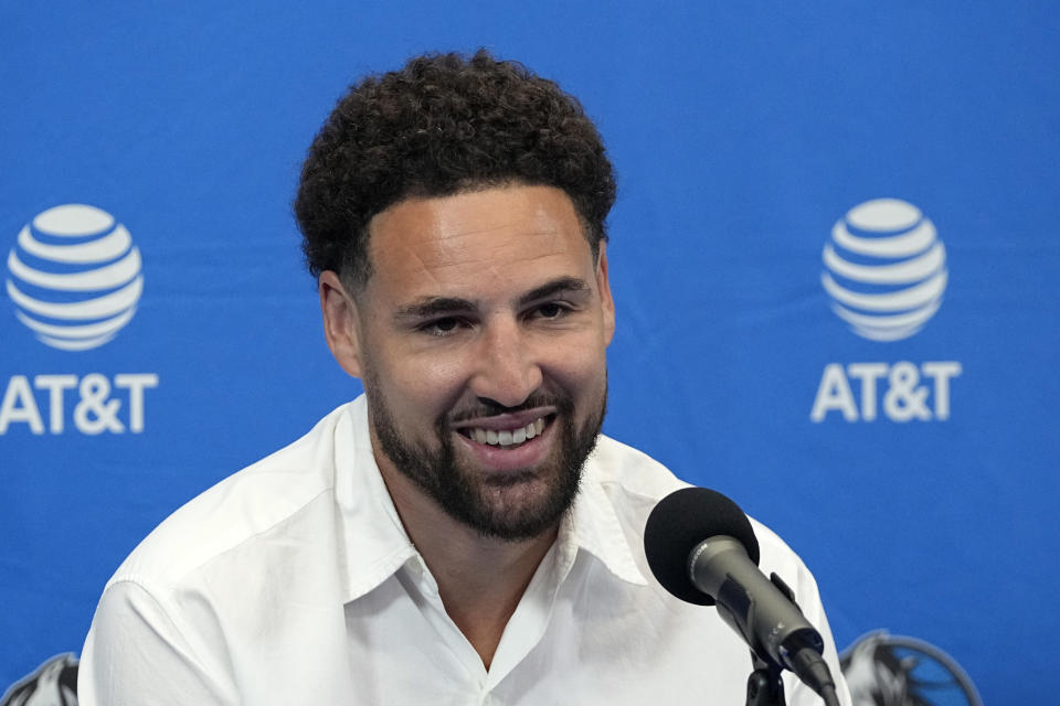 Klay Thompson responds to questions during an NBA basketball news conference where he was introduced as one of the team's latest acquisitions in Dallas, Tuesday, July 9, 2024. (AP Photo/Tony Gutierrez)