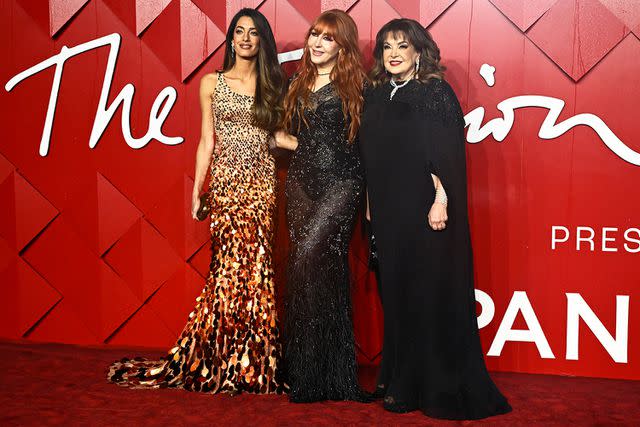 <p>Gareth Cattermole/Getty</p> Amal Clooney, Charlotte Tilbury and Baria Alumuddin attend The Fashion Awards on December 4, 2023 in London, England.