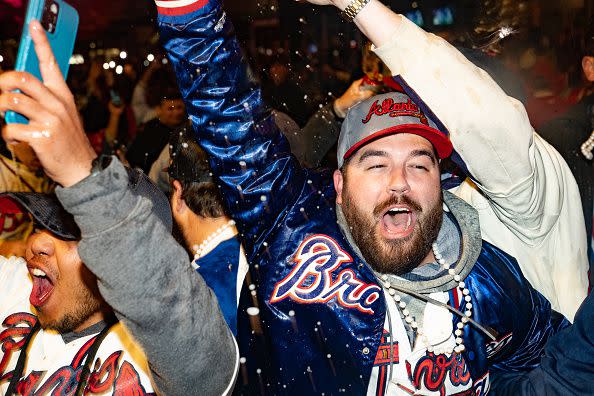 ATLANTA, GA - NOVEMBER 05: Atlanta Braves manager Brian Snitker and family  wave to fans during the World Series Parade and Celebration on November  5th, 2021 in Atlanta, GA. (Photo by Rich