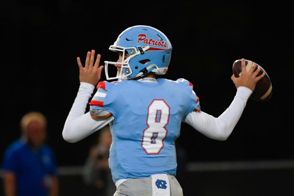 J.L. Mann's Ethan Anderson (8) throws the ball during a game against Woodmont that resulted in a 14-7 win for the Patriots on Thursday, September 29, 2022. 