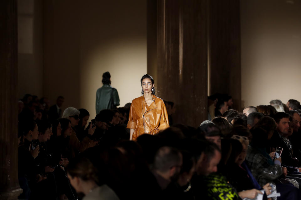 A model wears a creation as part of the Salvatore Ferragamo women's Fall-Winter 2019-20 collection, unveiled during the Fashion Week in Milan, Italy, Saturday, Feb. 23, 2019. (AP Photo/Antonio Calanni)