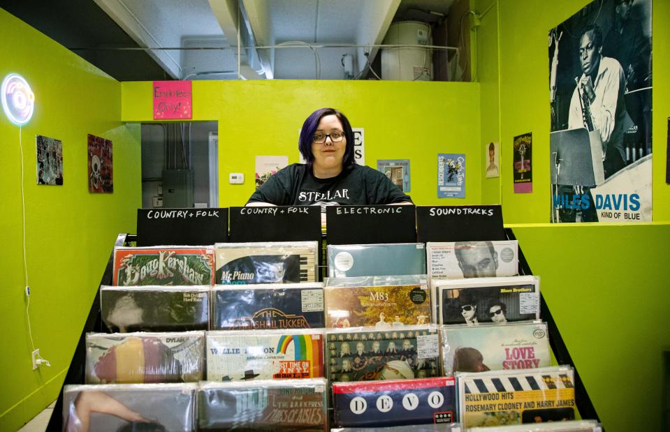 Liz Cochran, the owner of Stellar Records in Fort Myers stands for a portrait on Thursday, April 11, 2024. The store sells new and vintage vinyl records, cassette tapes, vintage decor and more. The store will take part in Record Store Day, where U.S. record stores sell cool, limited-edition vinyl records. The event is on April 20.