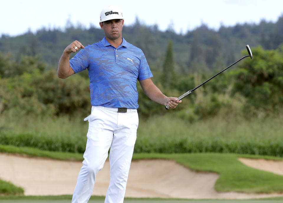 Gary Woodland reacts to making birdie on the 11th green during the final round of the Tournament of Champions golf event, Sunday, Jan. 6, 2019, at Kapalua Plantation Course in Kapalua, Hawaii. (AP Photo/Matt York)
