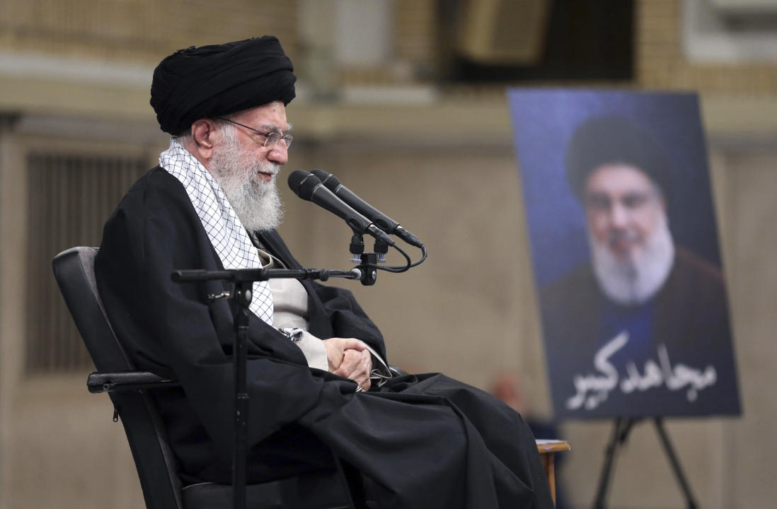 In this photo released by an official website of the office of the Iranian supreme leader, Supreme Leader Ayatollah Ali Khamenei listens to a speaker in a meeting in Tehran, Iran, Wednesday, Oct. 2, 2024. (Office of the Iranian Supreme Leader via AP)