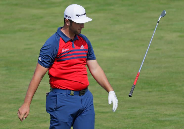 HARTFORD, WI - JUNE 15: Jon Rahm throws his club after playing his shot on the 17th hole. (Getty)