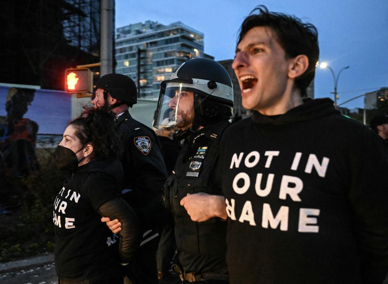 Police arrest hundreds, including members of the Jewish group Not In Our Name, at a pro-Palestinian protest in Brooklyn on April 23, 2024. <a href="https://www.gettyimages.com/detail/news-photo/police-intervene-and-arrest-hundreds-of-people-as-a-pro-news-photo/2149352808?searchscope=image%2Cfilm&adppopup=true" rel="nofollow noopener" target="_blank" data-ylk="slk:Fatih Aktas/Anadolu via Getty Images;elm:context_link;itc:0;sec:content-canvas" class="link ">Fatih Aktas/Anadolu via Getty Images</a>