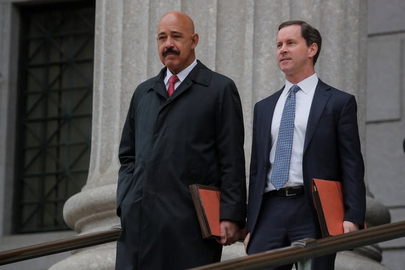 Theodore Wells, the lawyer for Exxon, exits New York State Supreme Court in New York