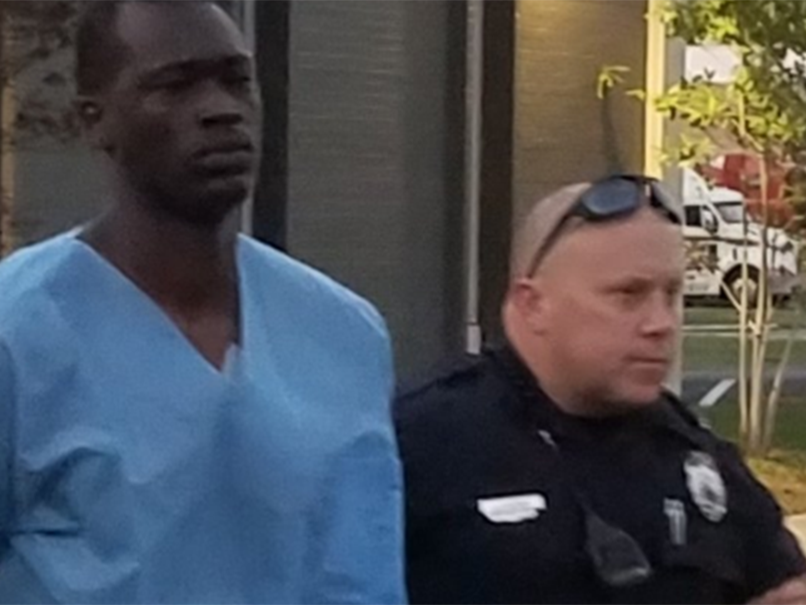 Emanuel Kidega Samson, who shot himself in the chest amid the scuffle with Mr Engle, was taken into police custody after he was treated for his injury: Metro Nashville PD