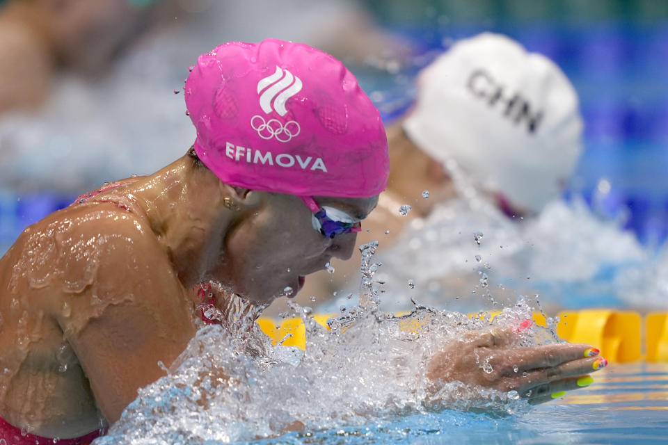 Yuliya Efimova of the Russian Olympic Committee swims in a heat during the women's 100-meter breaststroke at the 2020 Summer Olympics, Sunday, July 25, 2021, in Tokyo, Japan. (AP Photo/Martin Meissner)