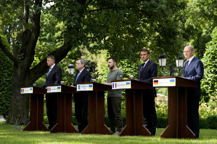 FILE - From left, Romanian President Klaus Iohannis, Prime Minister of Italy Mario Draghi, Ukraine President Volodymyr Zelenskyy, France's President Emmanuel Macron and German Chancellor Olaf Scholz attend a conference at the Mariyinsky palace in Kyiv, Ukraine, Thursday, June 16, 2022. (AP Photo/Natacha Pisarenko, File)