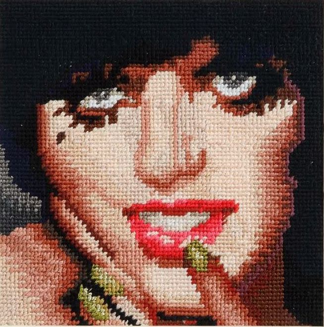 This photo provided by the Metropolitan Museum of Art shows Francesco Vezzoli's embroidery "Liza Minnelli," in the museum's new exhibition "Regarding Warhol: Sixty Artists, Fifty Years." The exhibition begins Tuesday, Sept. 18, 2012, and runs through Dec. 31. (AP Photo/Metropolitan Museum of Art)