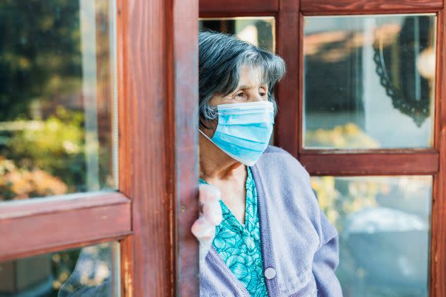 Senior woman with facial mask,Covid 19.