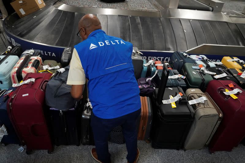 FILE PHOTO: Lines remain at airports after cyber outage, in Atlanta