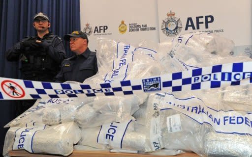 Australian Federal Police guard US$525 million worth of crystal methamphetamine and heroin after smashing a Hong Kong-based international drugs syndicate in Sydney on July 31. It was the largest haul of icein Australian history and the third-biggest heroin bust