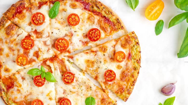 Zucchini pizza crust with tomatoes
