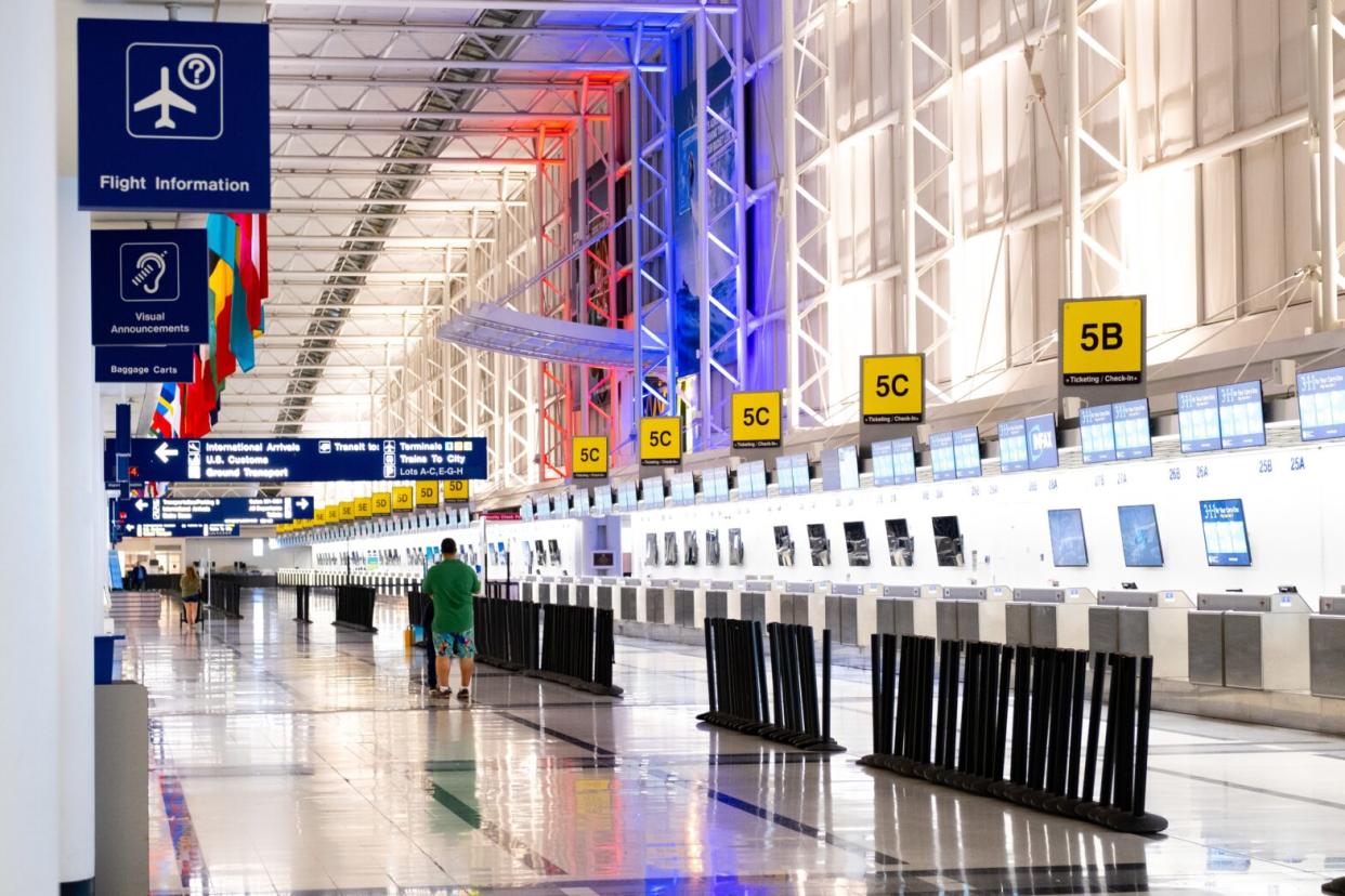 Airport terminal lit up at night