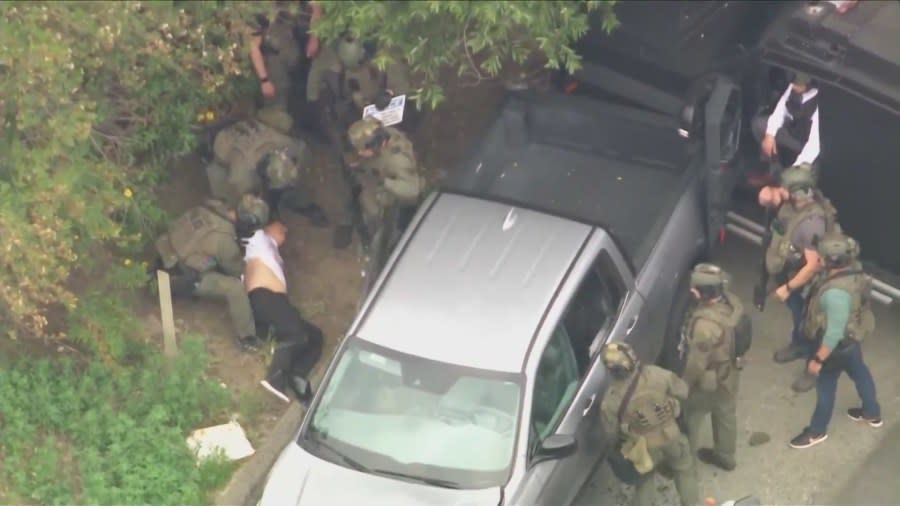 Rhean Fontanoza was dragged out of his truck and taken into custody after a SWAT standoff in Orange on May 16, 2024. (KTLA)