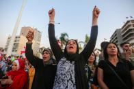 Demonstartors chant slogans during an anti-government protest in the southern city of Tyre