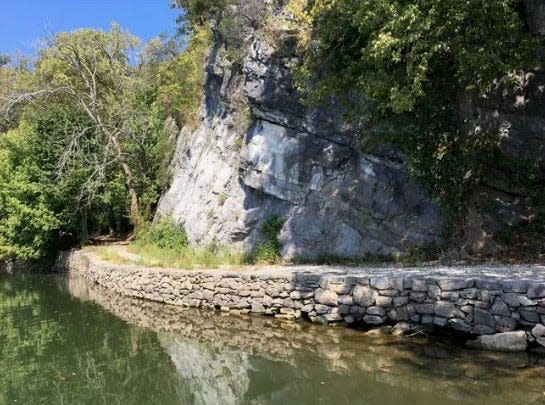 The historic stone retaining wall along McMahons Mill, part of the Chesapeake & Ohio Canal National Historical Park.