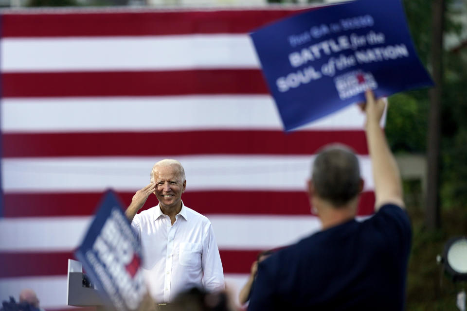 Democratic presidential candidate former Vice President Joe Biden greets supporters at a drive-in rally at Cellairis Amphitheatre in Atlanta, Tuesday, Oct. 27, 2020. (AP Photo/Andrew Harnik, File)