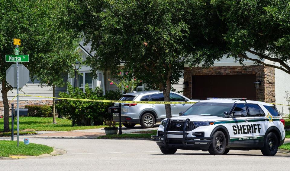 A St. Johns County Sheriff's Office vehicle sits blocking Rosella Court at the corner of Marisa Drive in the Coronado community near the scene of a shooting on Tuesday morning in St. Johns County.