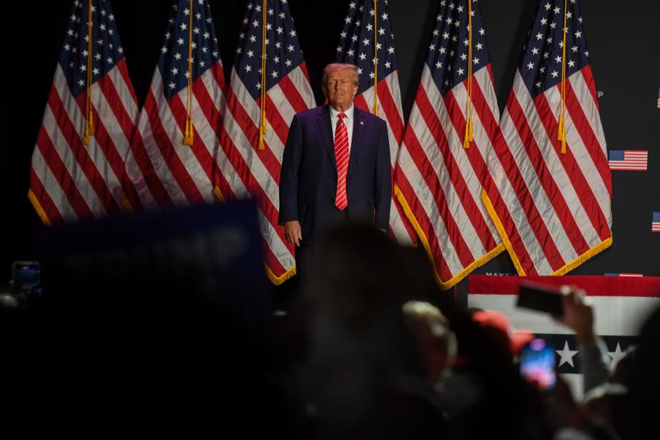 Former President Donald Trump greets supporters as he campaigns Sunday, October 29, 2023, at Orpheum Theatre in Sioux City, Iowa.