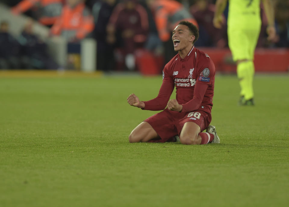 Trent Alexander-Arnold celebrates on the Anfield turf