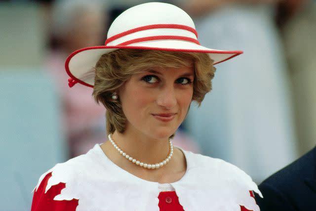 Getty Diana, Princess of Wales, wears an outfit in the colors of Canada during a state visit to Edmonton, Alberta.