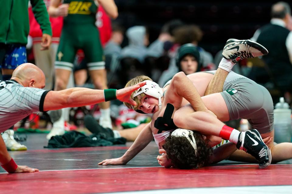 Trevor Jones of Delbarton nearly pins Donny Almeyda of Saint Joseph Regional in the 132-pound bout during the boys' wrestling team state finals at Jersey Mike's Arena in Piscataway on Sunday, Feb. 12, 2023.