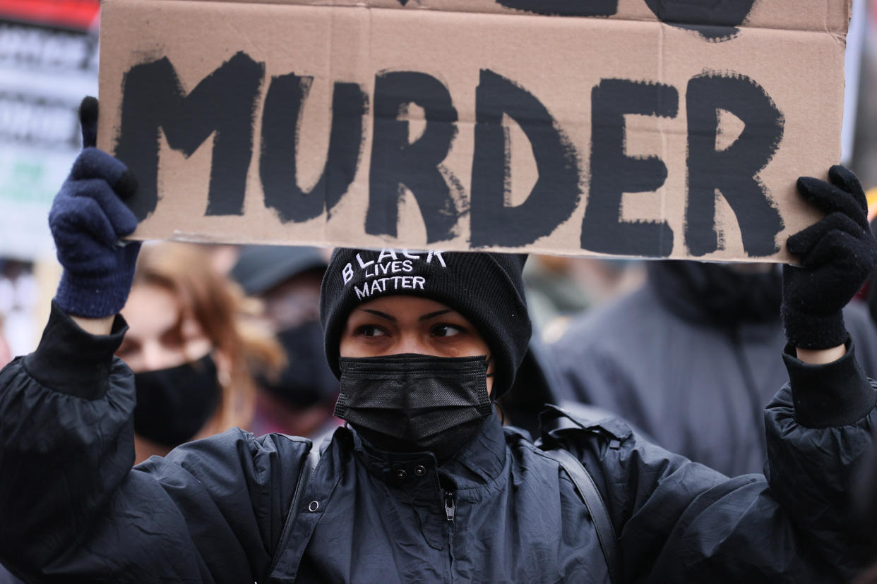 Demonstrators protest near the Hennepin County Courthouse in Minneapolis on April 19, 2021, as the jury deliberated in the trial of former police officer Derek Chauvin. The jury eventually convicted Chauvin of murdering George Floyd. (Photo: Scott Olson via Getty Images)