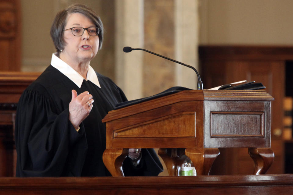 Kansas Supreme Court Chief Justice Marla Luckert gives the annual State of the Judiciary address to lawmakers in the Kansas House chamber, Wednesday, Jan. 11, 2023, in Topeka, Kan. The Kansas Supreme Court in 2019 declared that access to abortion is a "fundamental" right under the state constitution, and Kansas Attorney General Kris Kobach wants the court to reconsider that ruling. (AP Photo/John Hanna)