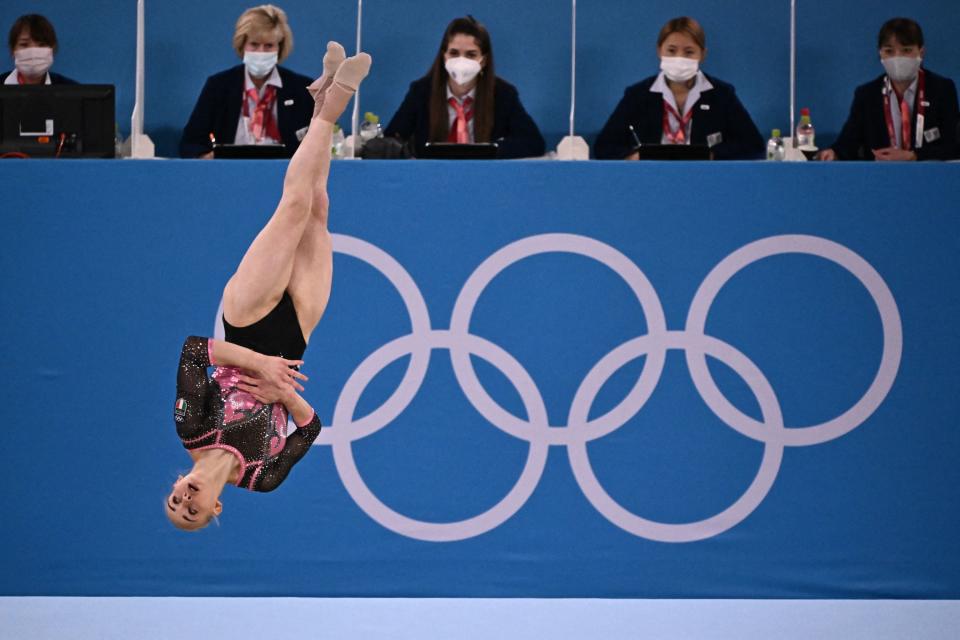 An Italian gymnast mid-air