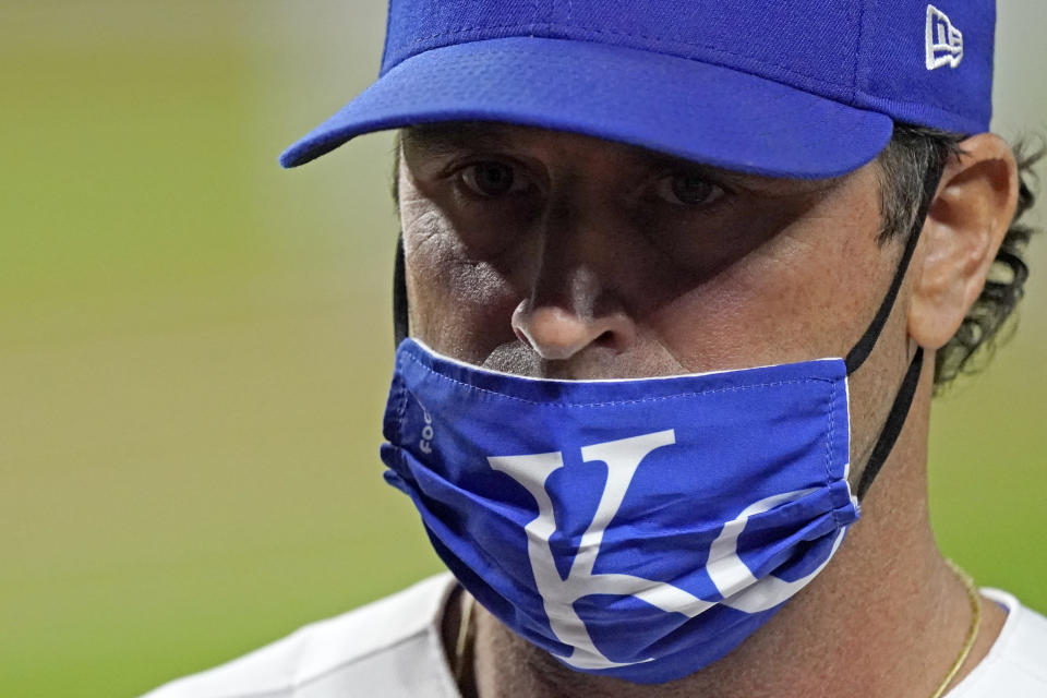 Kansas City Royals manager Mike Matheny walks back to the dugout after making a pitching change during the sixth inning of a baseball game against the St. Louis Cardinals Wednesday, Sept. 23, 2020, in Kansas City, Mo. (AP Photo/Charlie Riedel)