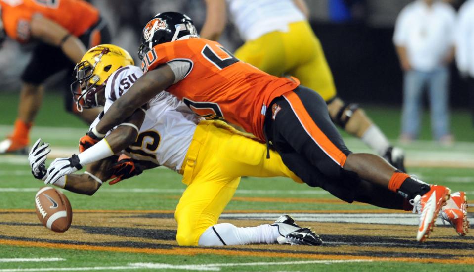 Linebacker Michael Doctor #40 of the Oregon State Beavers breaks up a pass intended for wide receiver Rashad Ross #15 of the Arizona State Sun Devils in the third quarter of the game on November 3, 2012 at Reser Stadium in Corvallis, Oregon. The Beavers won the game 36-26. (Photo by Steve Dykes/Getty Images)