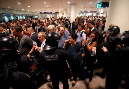 Protesters demonstrate at the airport, after a verdict in a trial over a banned independence referendum, in Barcelona