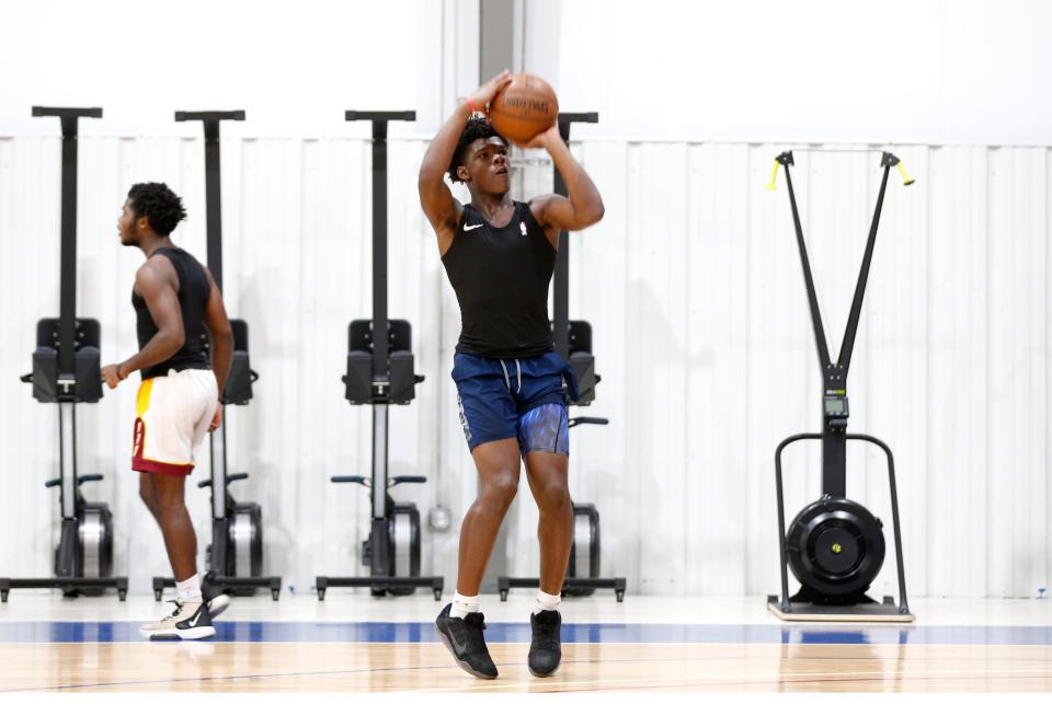 Davion Hill shoots a basket as he trains at The Basketball Movement gym in Nixa on Tuesday, July 14, 2020. Hill is the brother of former MSU basketball star and current NBA Indiana Pacer Alize Johnson.