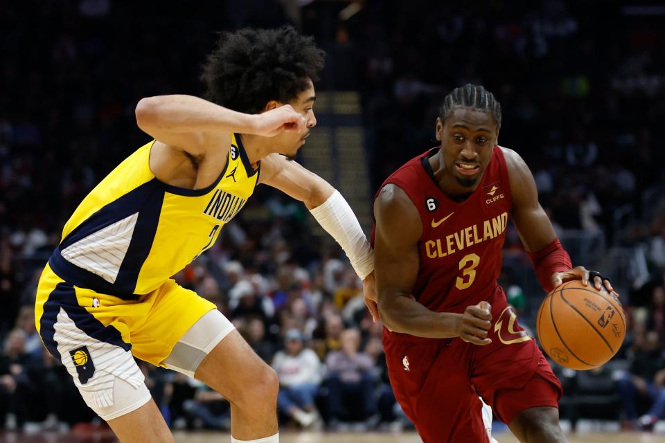 Cleveland Cavaliers guard Caris LeVert (3) drives against Indiana Pacers guard Andrew Nembhard during the first half Sunday, April 2, 2023, in Cleveland.