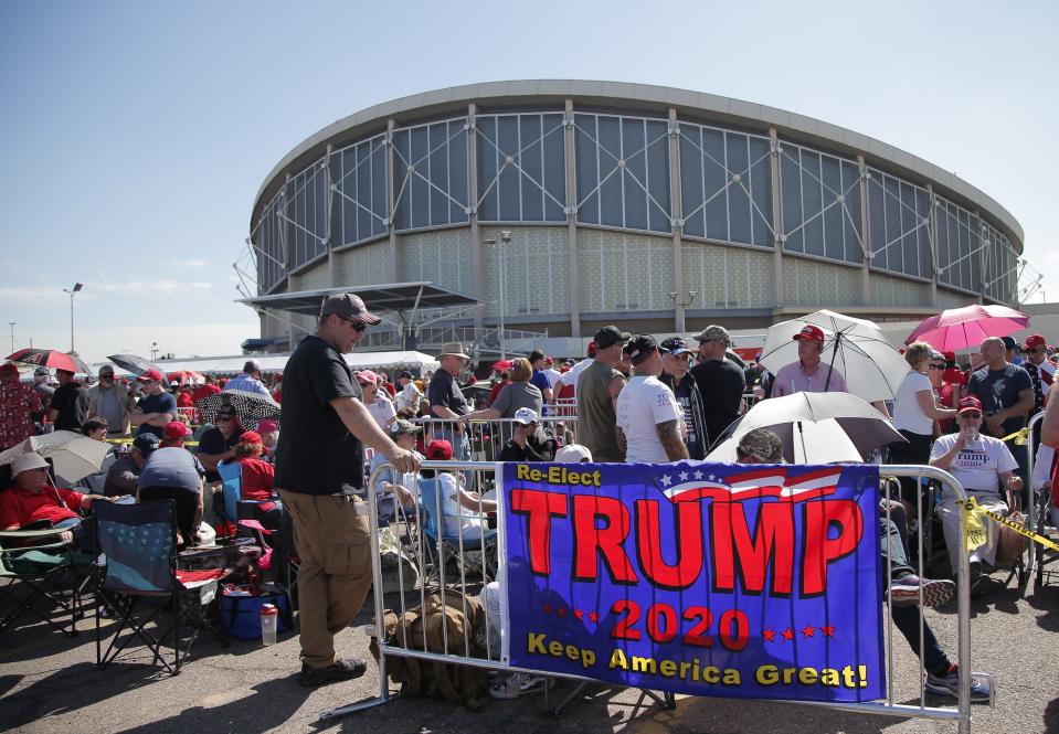 Supporters of President Donald Trump wait in line for the Keep America Great Rally at Arizona Veterans Memorial Coliseum in Phoenix on Feb. 19, 2020.