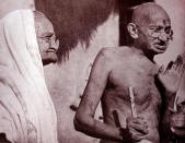 Mahatma Gandhi and his wife Kasturba, at Sevagram a village in the state of Maharashtra, India. Sevagram was the place of Mohandas Gandhi's ashram and his residence from 1936 to his death in 1948. (Photo by: Universal History Archive/Universal Images Group via Getty Images)