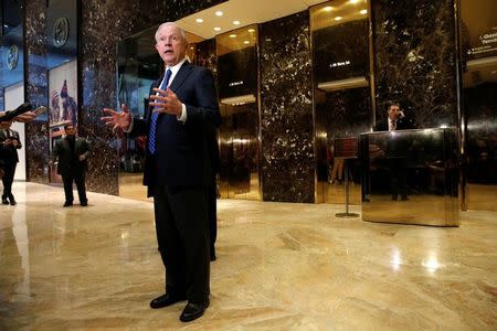 U.S. Senator Jeff Sessions (R-AL), an advisor to U.S. President Elect Donald Trump, speaks to members of the media in the lobby of Trump Tower in the Manhattan borough of New York City, New York November 17, 2016. REUTERS/Mike Segar