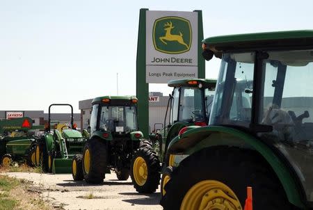 John Deere commercial vehicles are seen at a dealer in Longmont, Colorado August 18, 2010. REUTERS/Rick Wilking