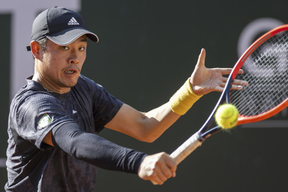 China's Yibing Wu returns a ball to Germany's Alexander Zverev during their quarter-final match at the Geneva Open tennis tournament in Geneva, Switzerland, Thursday, May 25, 2023. (Martial Trezzini/Keystone via AP)