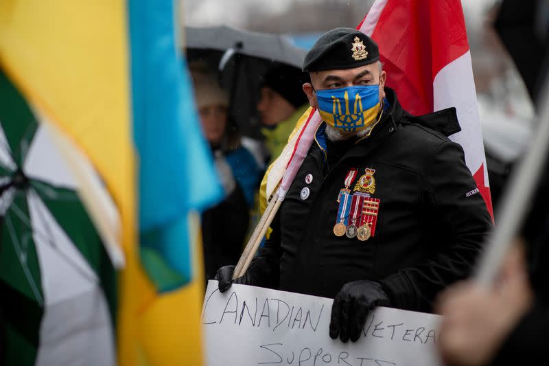 People rally outside the Ukrainian Consulate in Toronto