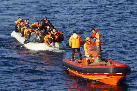 A Turkish Coast Guard fast rigid-hulled inflatable boats tow refugees and migrants in a dinghy on the Turkish territorial waters of the North Eagean Sea, following a failed attempt of crossing to the Greek island of Lesbos, off the shores of Canakkale, Turkey, November 9, 2015. REUTERS/Umit Bektas